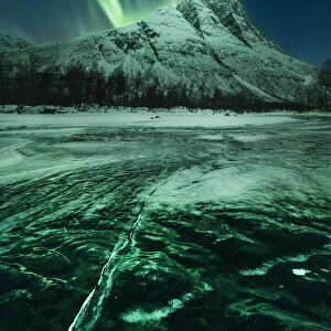 Northern lights over Mount Otertinden in the Tromso region, Norway