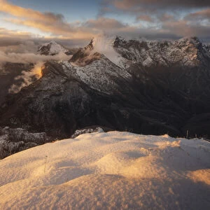 The Pania della Croce and Pania Secca seen from the Monte Croce during a winter sunset in