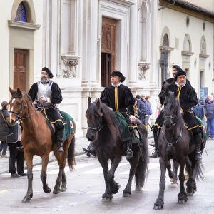 Participants in the Explosion of the Cart festival horse riding, Florence, Tuscany