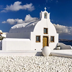 Pretty white church in Oia, Santorini, South Aegean, Greece