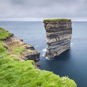 Sea stack called Dun Briste at Downpatrick Head from the surrounding cliffs