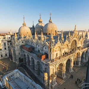 St Marks Basilica, St Marks Square, Venice, Veneto, Italy. High angle view at sunset