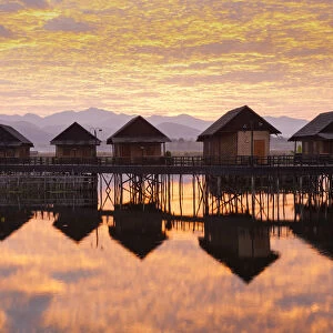 Sunrise & hotel cabins over Inle Lake, Inle, Shan State, Myanmar (Burma)