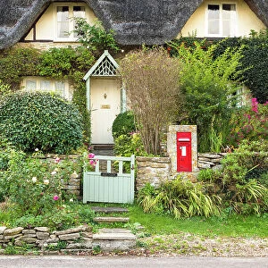 A thatched cottage in Lacock village, Wiltshire, England
