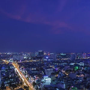 Vietnam, Ho Chi Minh City, elevated skyline view above the Chill Sky Bar, dusk