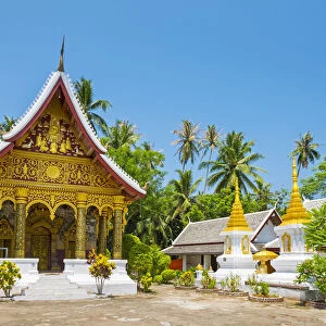 Wat Paphaimisaiyaram temple and stupas in front of monks quarters, Luang Prabang