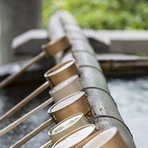 Water ladles at Shinto shrine of Sumiyoshi Taisha, Osaka, Kansai, Japan