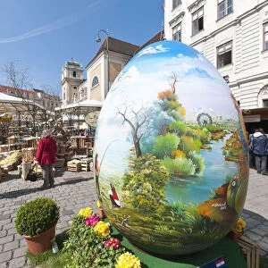A giant painted egg marks the entrance to the Old Vienna Easter Market at the Freyung