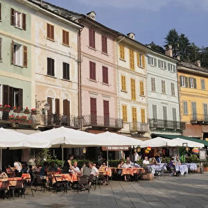 Italy, Lombardy, Lake Orta, cafes lining Piazza Motta, Orta San Giulio