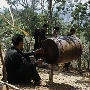 LAOS, Tribal People, Meo Tribe Meo men playing musical instruments during the