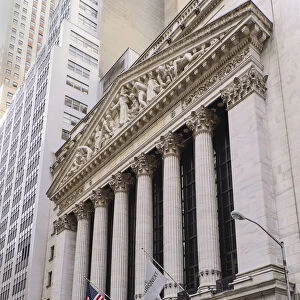 USA, New York, Manhattan, Wall Street Stock Exchange, the facade with American flags