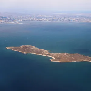 An aerial view of the Caspian Sea near the city of Baku is pictured through the window of