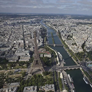 An aerial view shows the Eiffel tower, the Seine River and the Paris skyline
