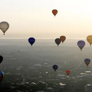 Balloons fly across Bristol city centre during the 2006 Bristol International Balloon