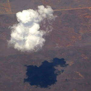 A clouds floats above agricultural farming land in south-western New South Wales