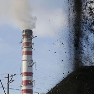 Coal is sorted into a pile at a warehouse of the Trypillian thermal power plant in Kiev