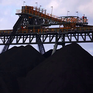 Coal is unloaded onto large piles at the Ulan Coal mines near the central New South Wales