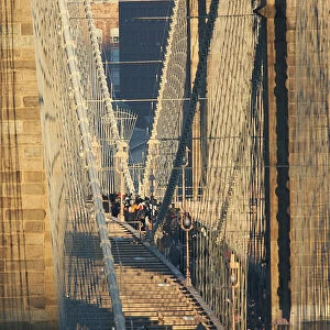 Commuters pack the Brooklyn Bridge in New York