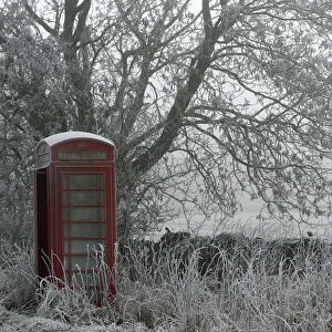 A frost covered telephone box stands in Newhaven, central England