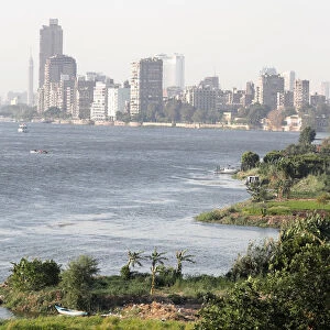 Hotels and houses are seen near the River Nile and fields on the outskirts of Cairo