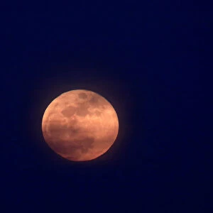 A full moon supermoon rises in Skopje