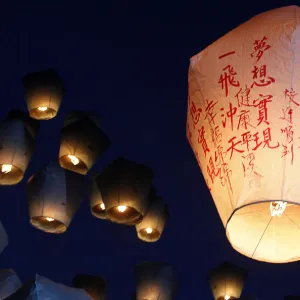 Sky lanterns are released ahead of the traditional Chinese Lantern Festival in Pingxi