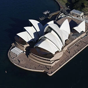 Tourist visit the Sydney Opera House on a sunny winter afternoon in Sydney