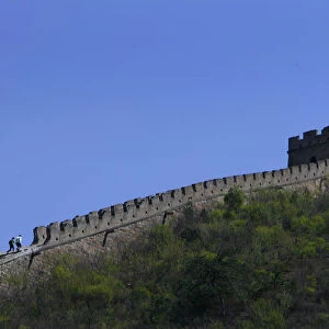 Tourists walk on a part of the Huanghuacheng section of Chinas Great Wall which was recently