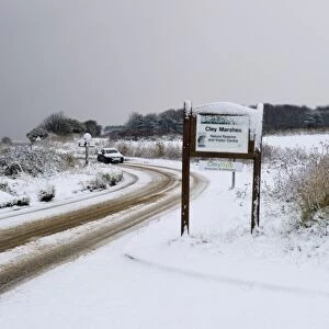 A149 coast road covered in snow at Cley NWT Reserve Cley Norfolk December