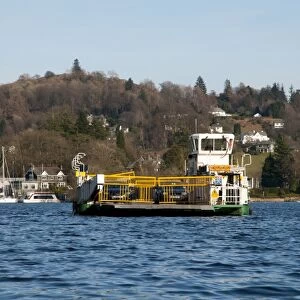 Car ferry travelling across lake, Lake Windermere, Lake District N. P. Cumbria, England, February