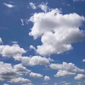 Cumulus clouds in blue sky, Cumbria, England, June