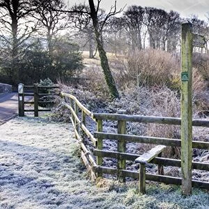 Frost on wooden fence with stile and Public Footpath sign, near Doeford Bridge, Whitewell, Forest of Bowland