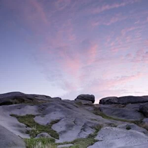 Gritstone rocks at twilight, Almscliff Crag rock formation, North Rigton, North Yorkshire, England, august
