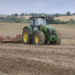 John Deere 7930 tractor with Vaderstad disc cultivator, cultivating arable field, Bridgnorth, Shropshire, England