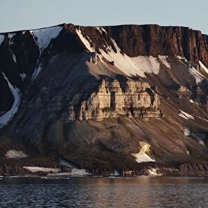 View of coastal mountains with snow, Spitsbergen, Svalbard, august