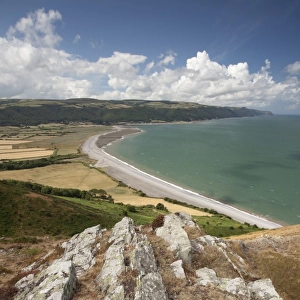 View of coastline looking from coast path on Hurlstone Point, with Worthy Wood and Porlock Common on distant hills