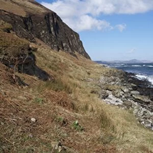 View of coastline, looking towards Jura, near McArthurs Head, Islay Sound, Islay, Inner Hebrides, Scotland, March
