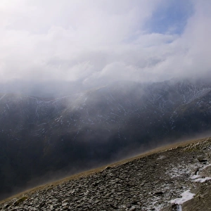 View of fell landscape with low cloud, Grisedale Pike, Lake District N. P. Cumbria, England, February