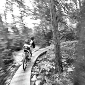 Aaron Rodgers mountain biking on the Stairway to Heaven Trail in Copper Harbor Michigan