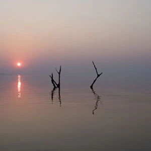 Africa, Zimbabwe, Matusadona National Park. Reflections on Lake Kariba. Credit as