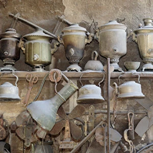 Azerbaijan, Lahic. A collection of antique kettles and pitchers