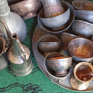 Azerbaijan, Lahic. A collection of engraved copper cups and mortars
