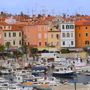 Buildings with antenna and boats by the water, Rovinj, Istria, Croatia