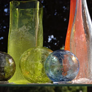 Canada, British Columbia, Salt Spring Island, Ganges. Blown glass balls and bottles