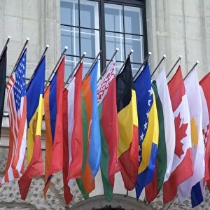 Europe, Austria, Vienna, country flags on Hofburg Palace exterior