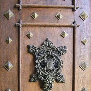 Europe, Czech Republic, Hluboka Castle. An intricate shield adorns the main door
