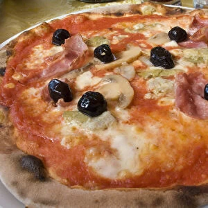 Europe, Italy, Positano. Plate of traditional Neapolitan pizza