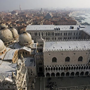 Europe, Italy, Venice. Doges Palace and domes ofSt. Marks Basilica from the Campanile