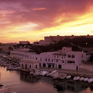 Europe, Spain, Balearics, Menorca, Ciutadella. Sunset over harbor