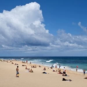 Honolulu, Hawaii. People on white sand of Sandys Beach Park in Oahu